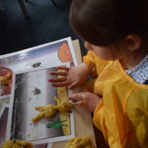 children making biscuits in the shape of an alien