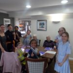 Students in the dining room with Bingo players