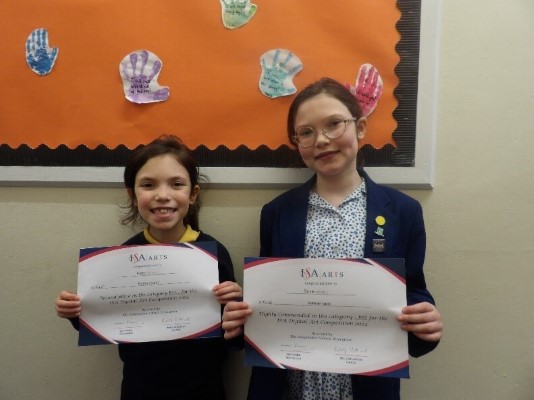 students holding certificates